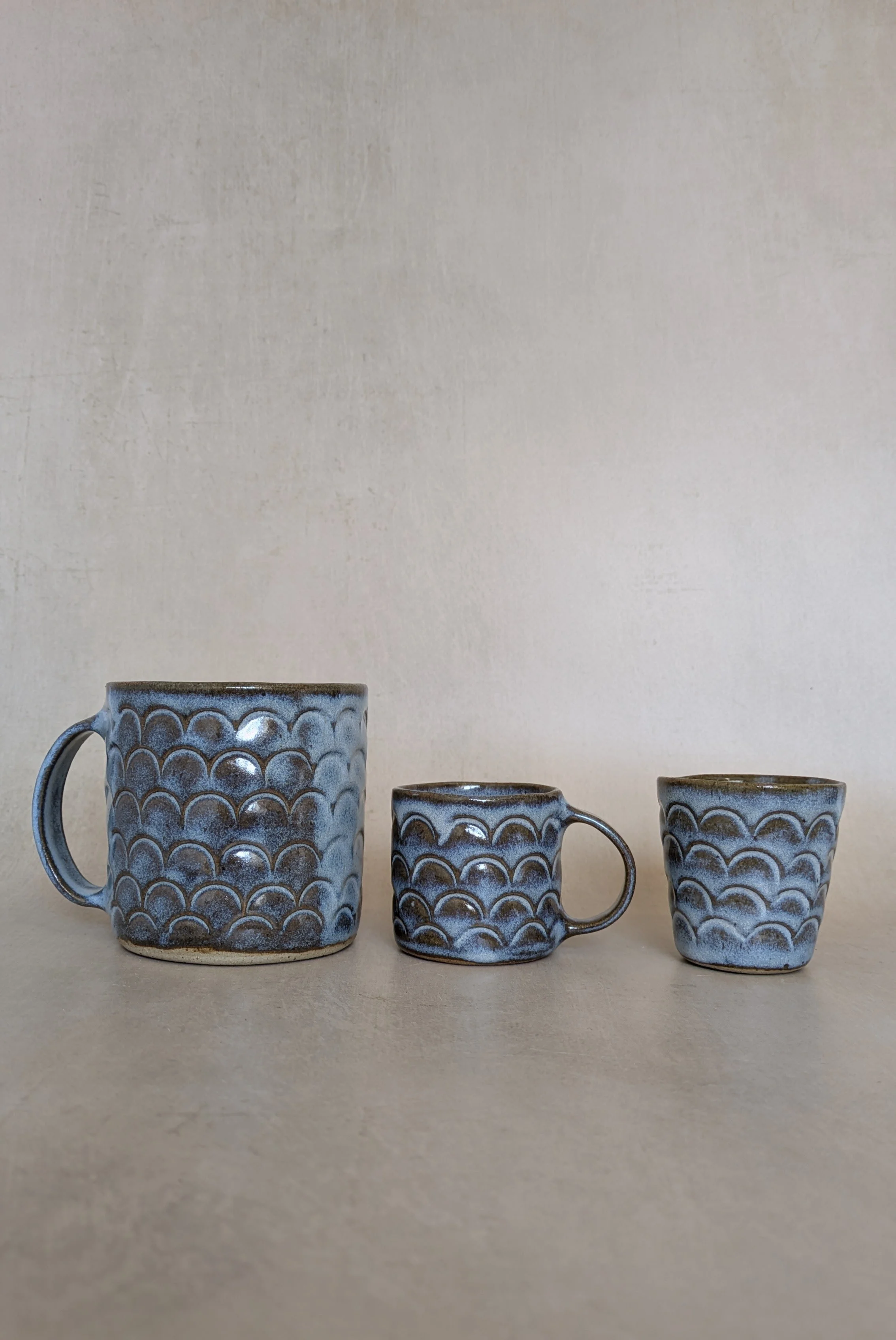 large-mug-with-small-muh-and-little-cup-in-blue-glaze.jpg.jpg