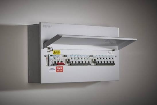 Electrical breaker panel with open cover, containing multiple circuit breakers.