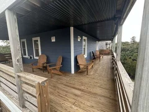 Bedroom floor deck with rain guard and plenty of seating
