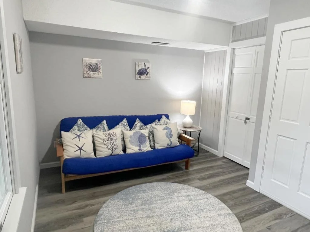 Entry floor room.  Perfect for some yoga or quiet reading!