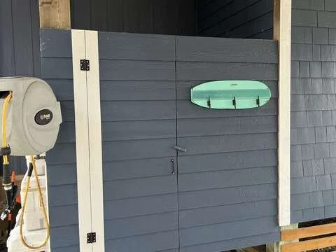 Outdoor shower with towel hook