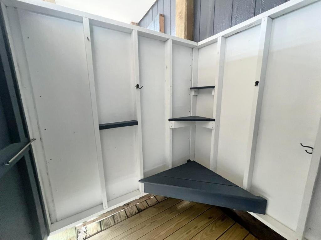 Outdoor shower shelves and seat!