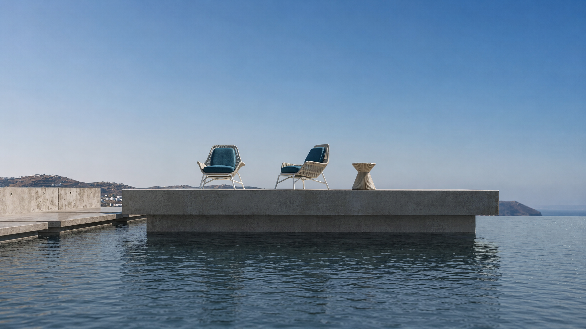 Minimalist Cycladic villa terrace with infinity pool 3D render, featuring modern outdoor lounge armchairs with teal cushions and panoramic Aegean sea view.
