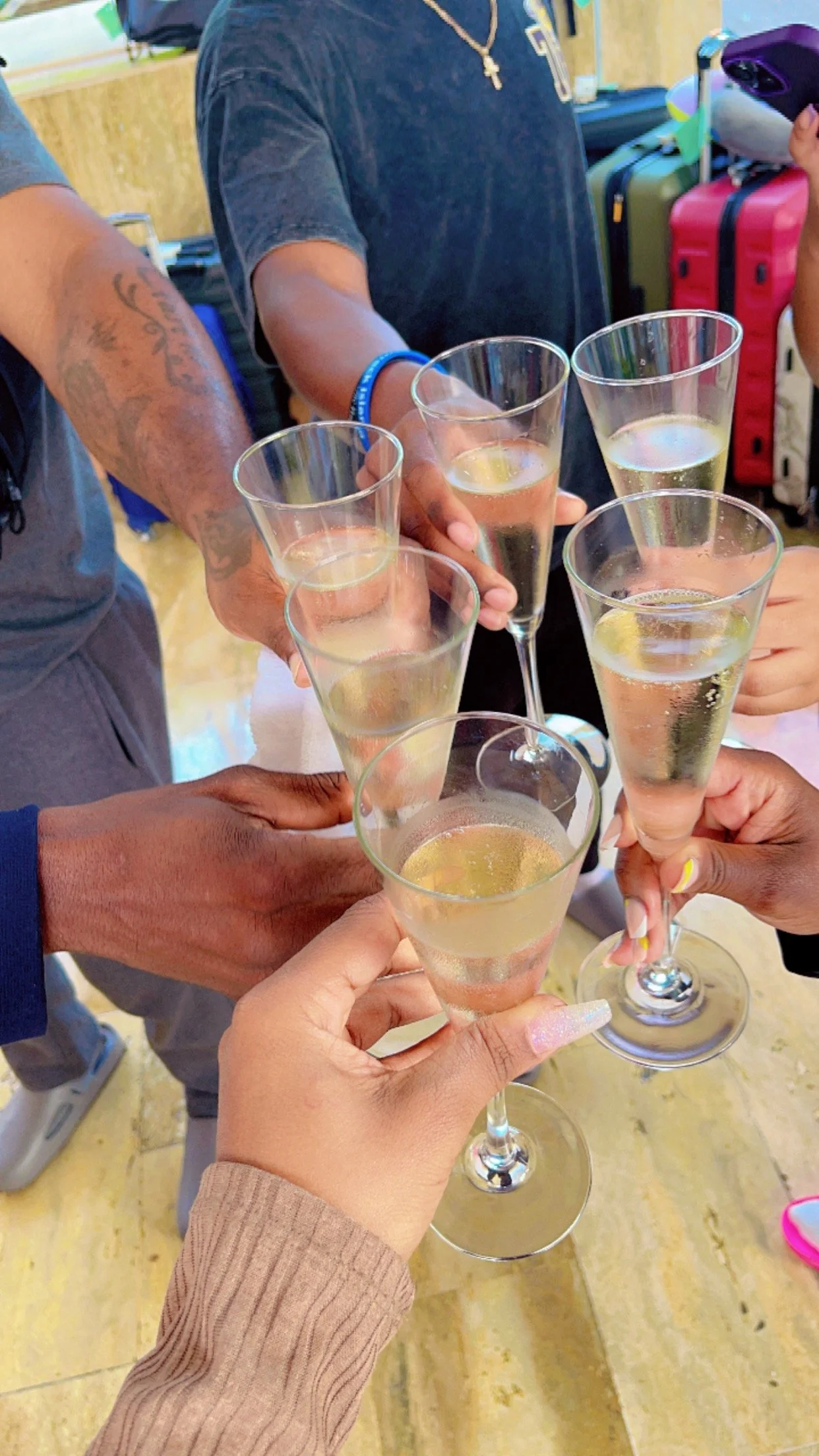 Friends celebrating a memorable vacation with a champagne toast.