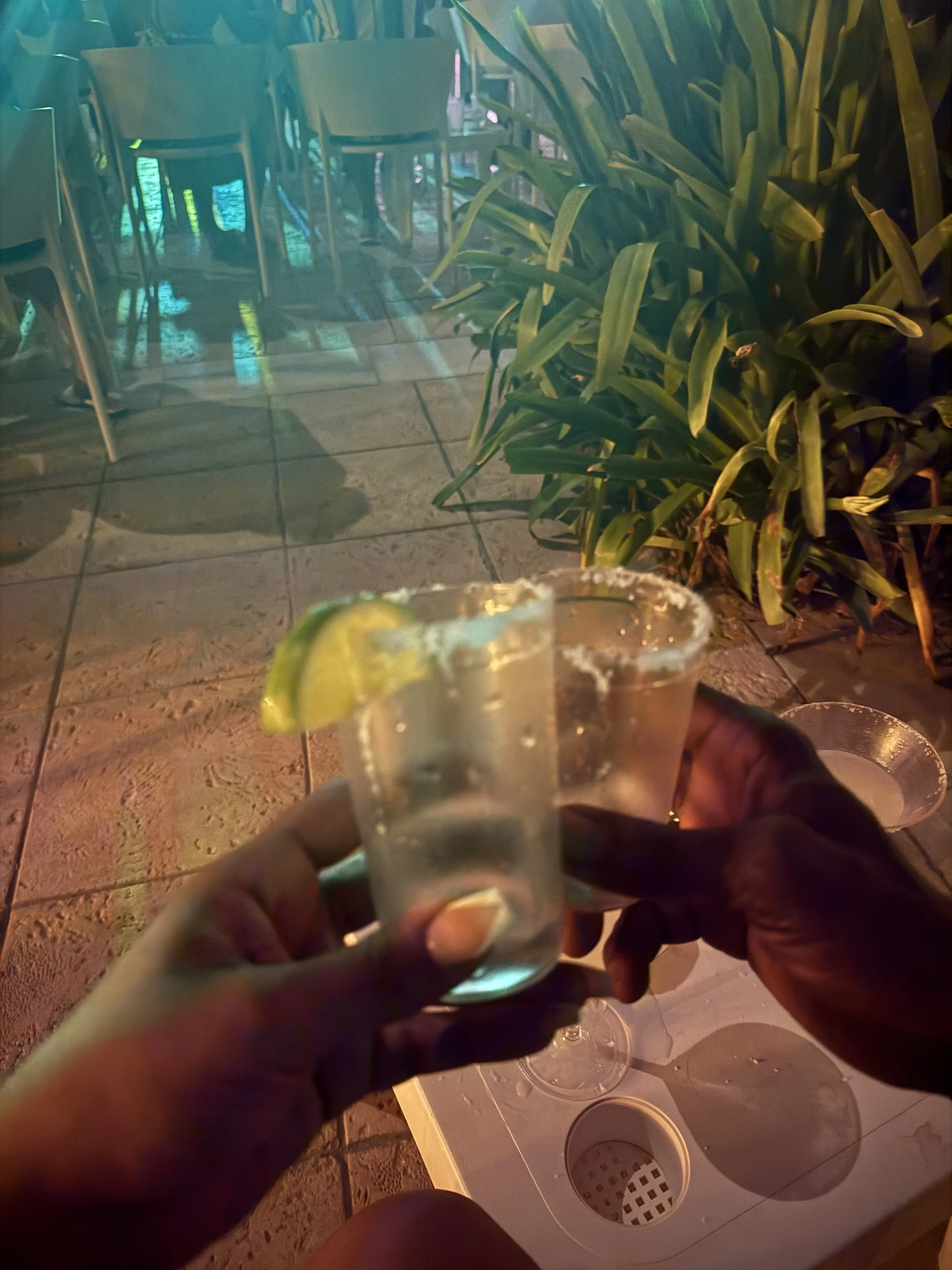 Refreshing tropical cocktail enjoyed at an all-inclusive resort.