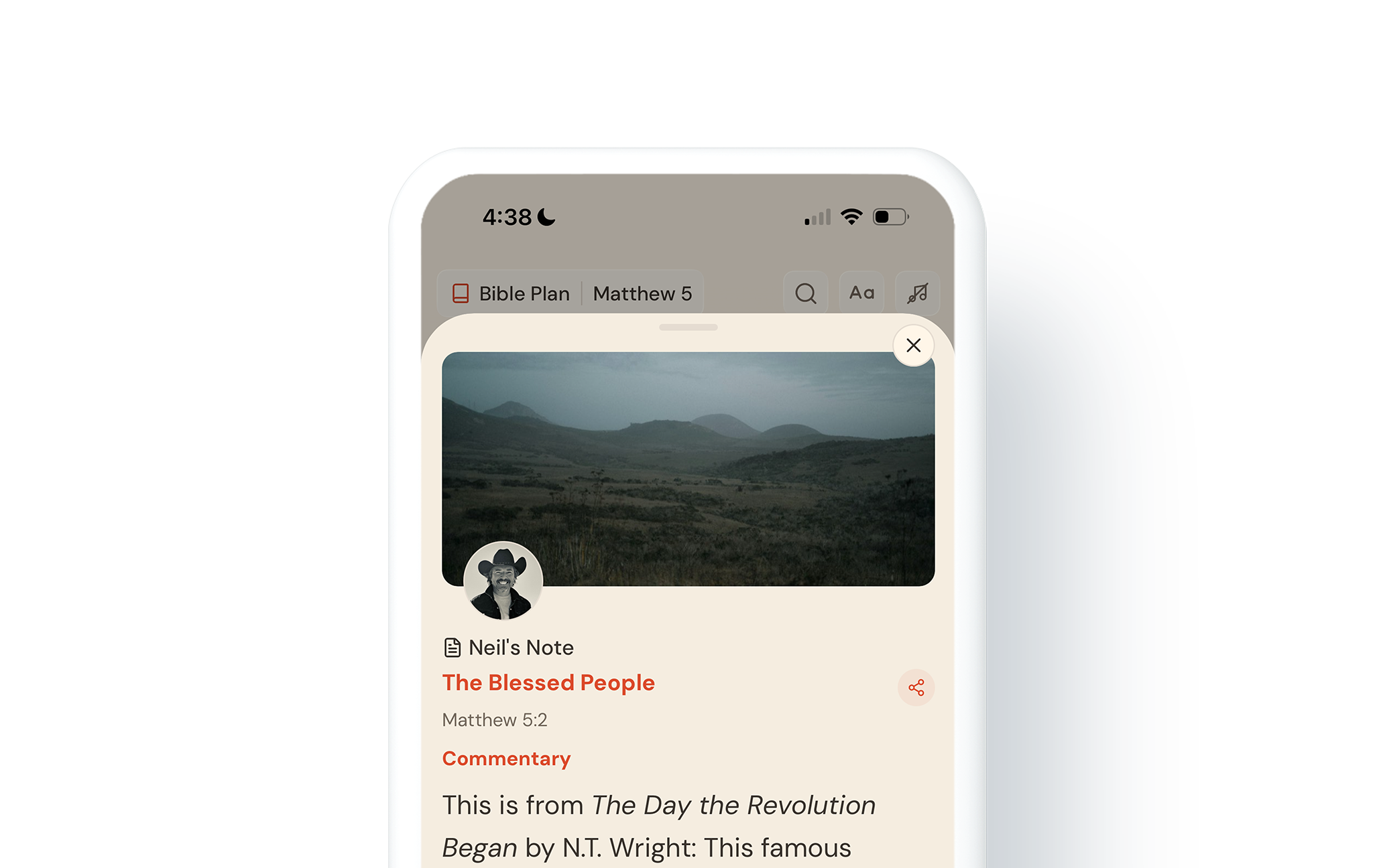 A smartphone screen displaying a Bible app with the open passage 'Matthew 5:2' and a note titled 'Neil's Note' about 'The Blessed People'. The battery, Wi-Fi, signal icons, and time 4:38 are visible at the top of the screen, along with a landscape landscape background featuring hills and mountains.