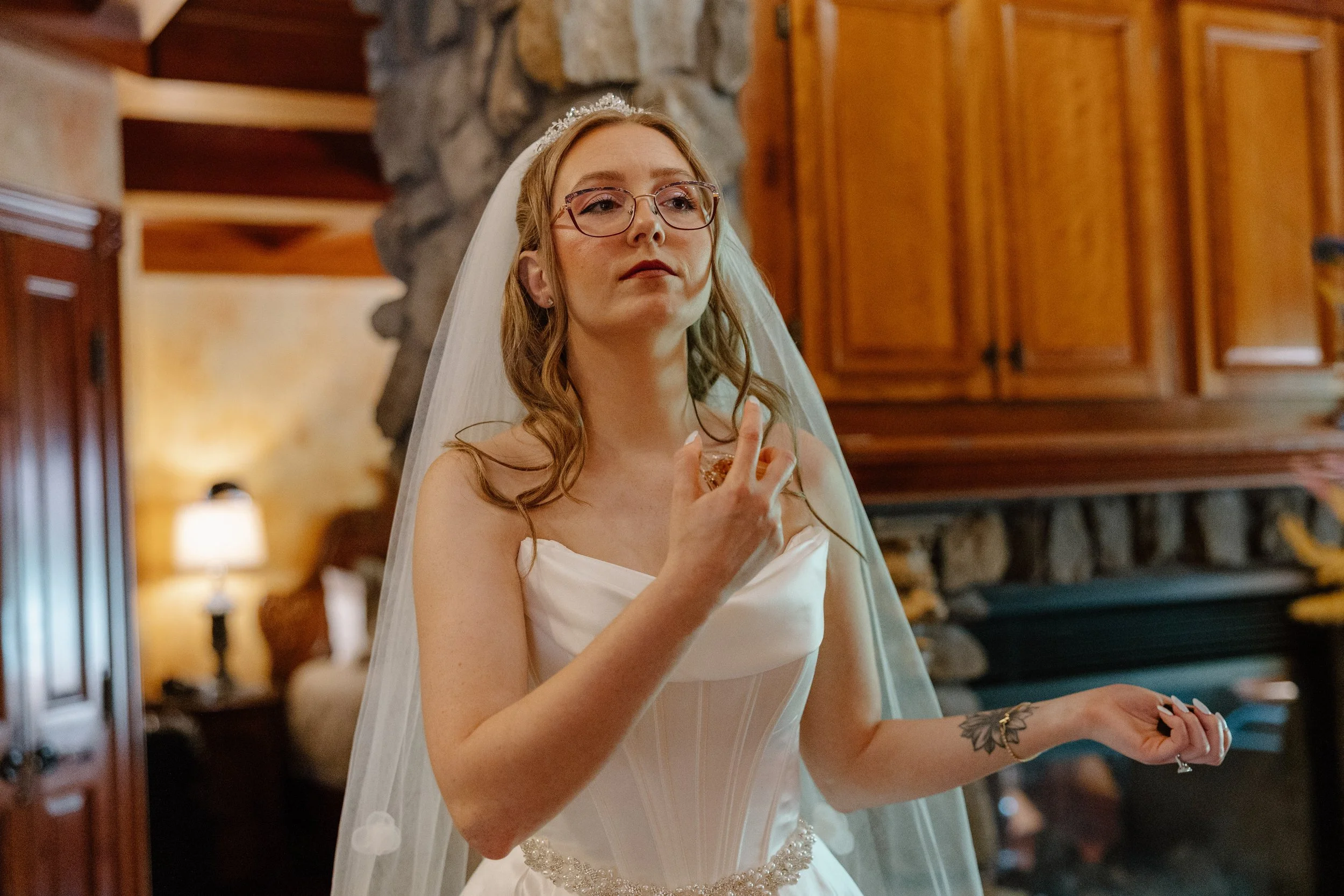 bride-applying-perfume-mohican-castle-wedding.jpg