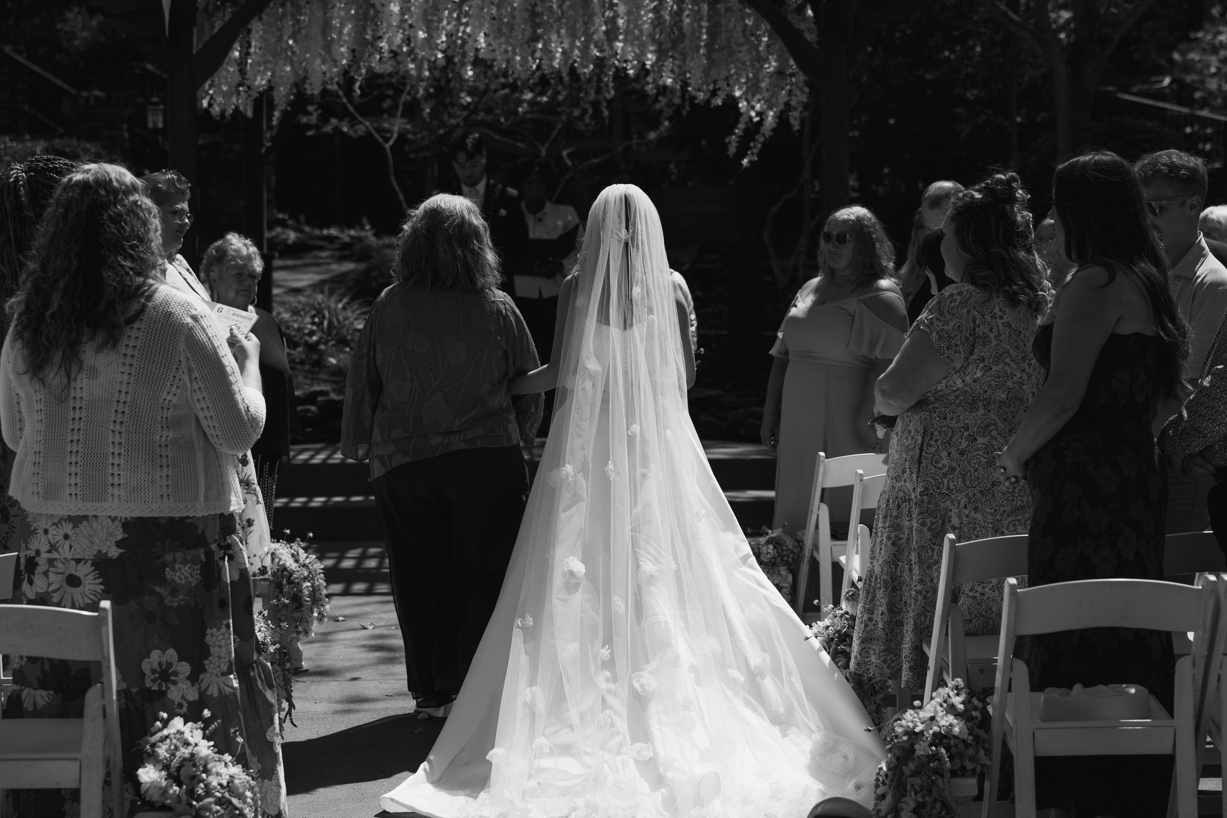 bride-walking-down-aisle-mohican-castle.jpg