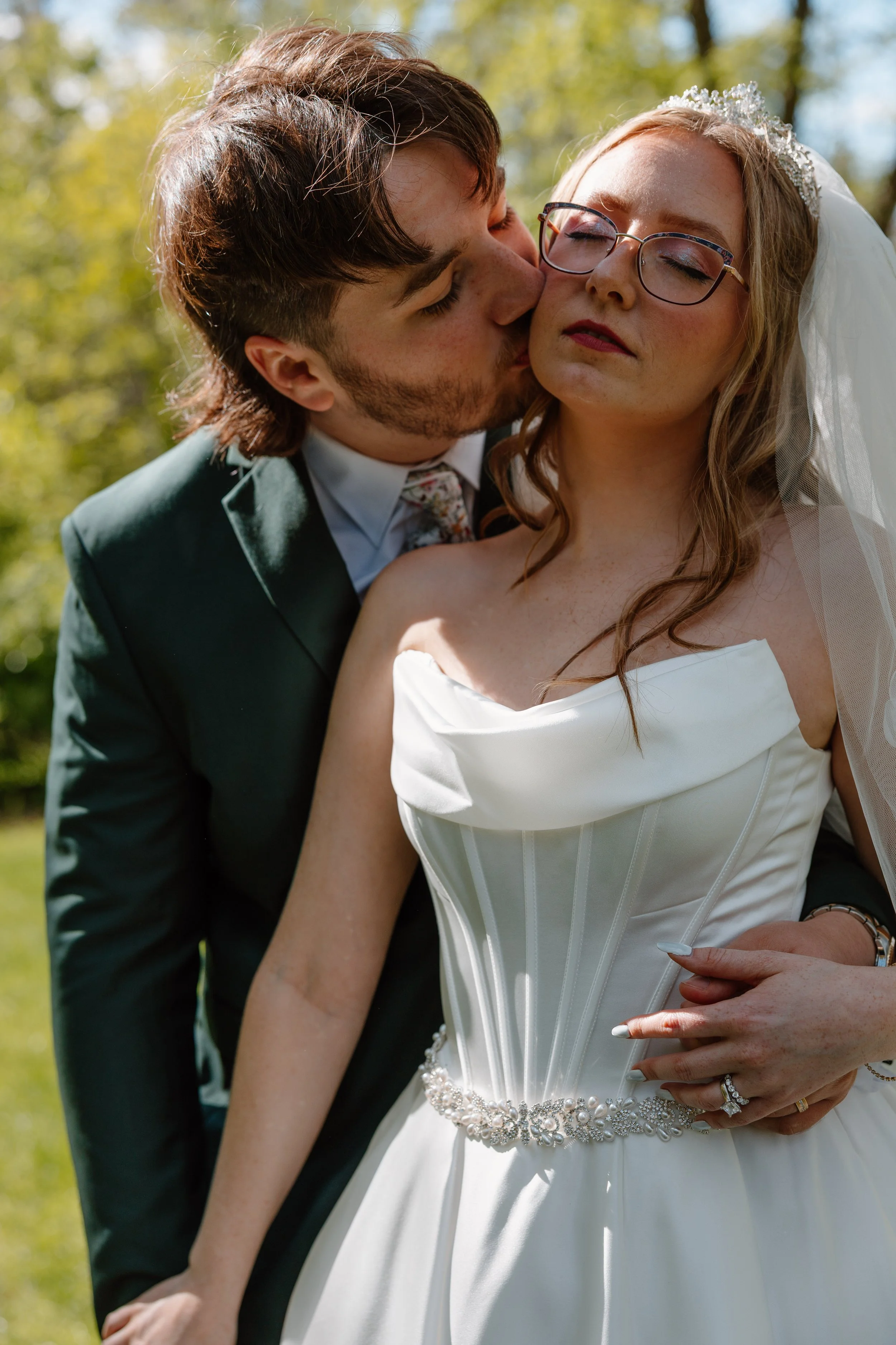 candid-groom-kissing-bride-mohican-castle.jpg