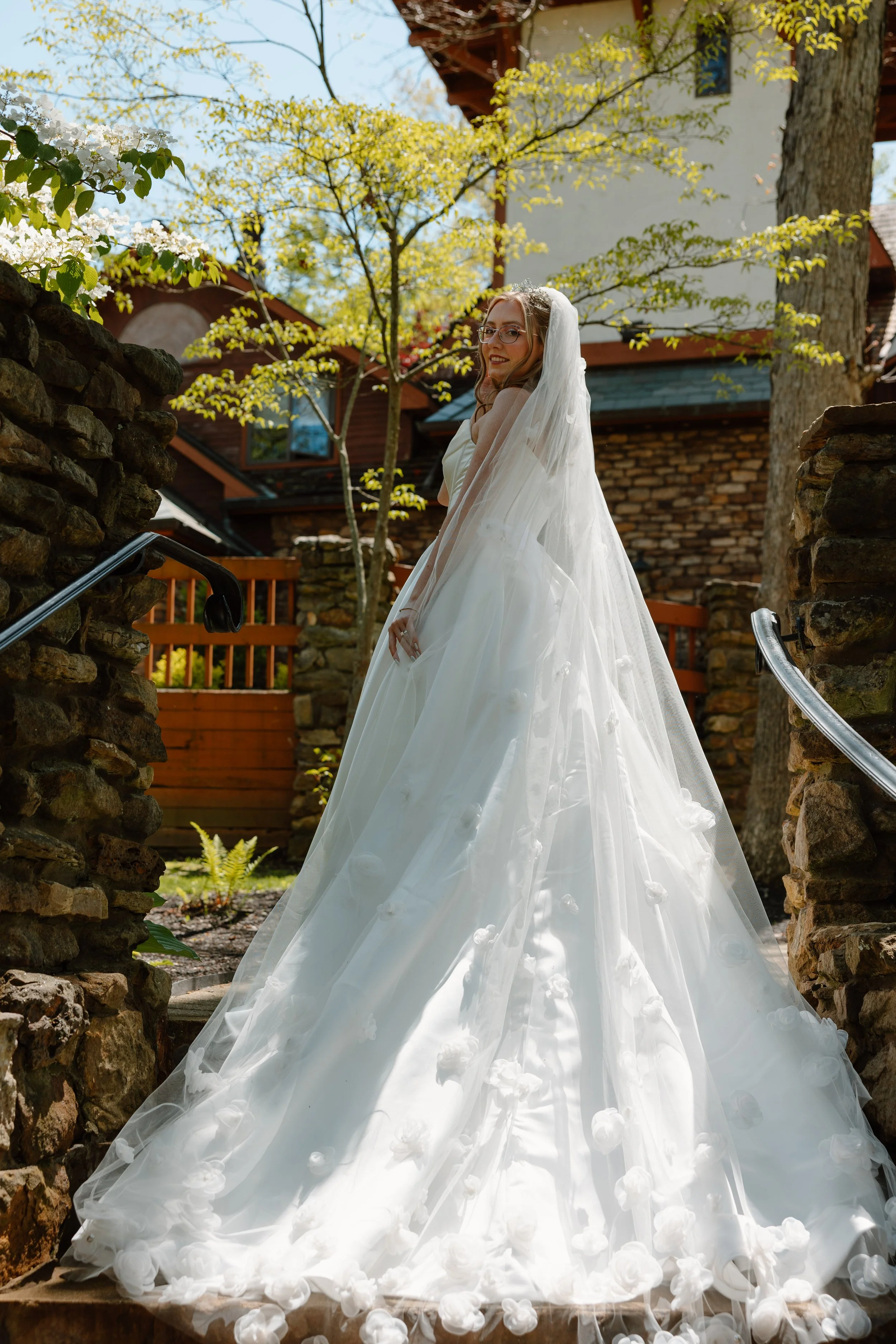 landolls-mohican-castle-bride-gown-train-stairs.jpg