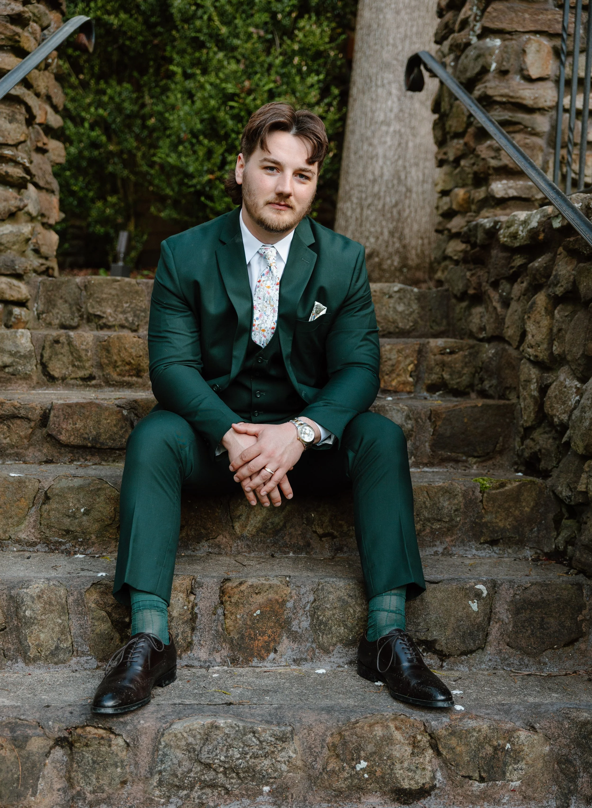 landolls-mohican-castle-groom-portrait-steps.jpg