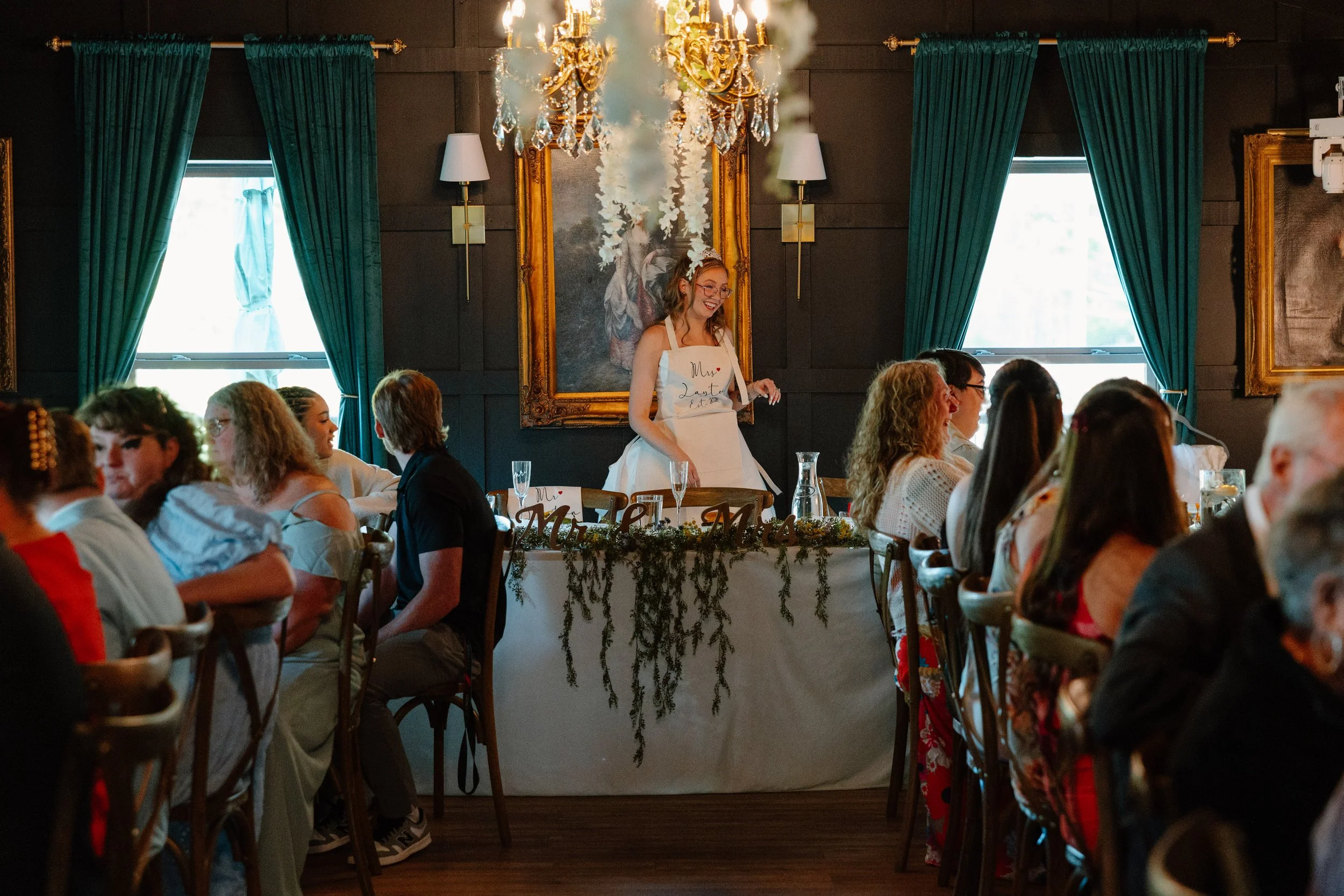 bride-wearing-apron-mohican-castle-reception.jpg