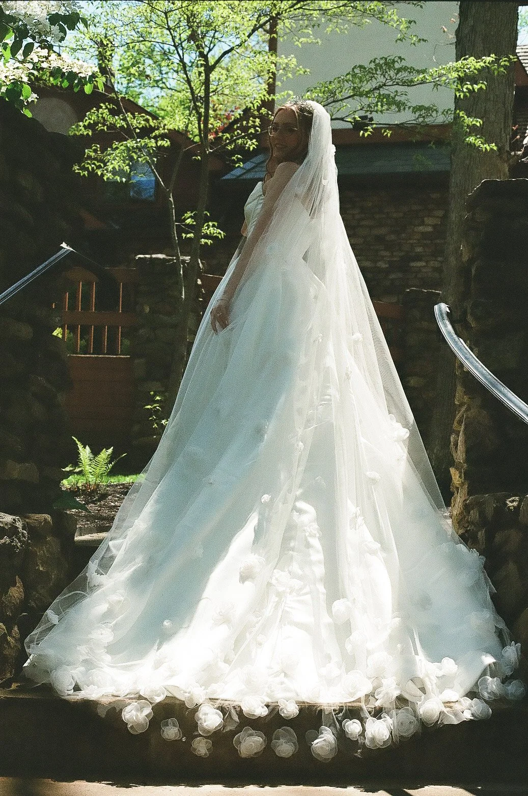 landolls-mohican-castle-bride-stairs-train.jpg