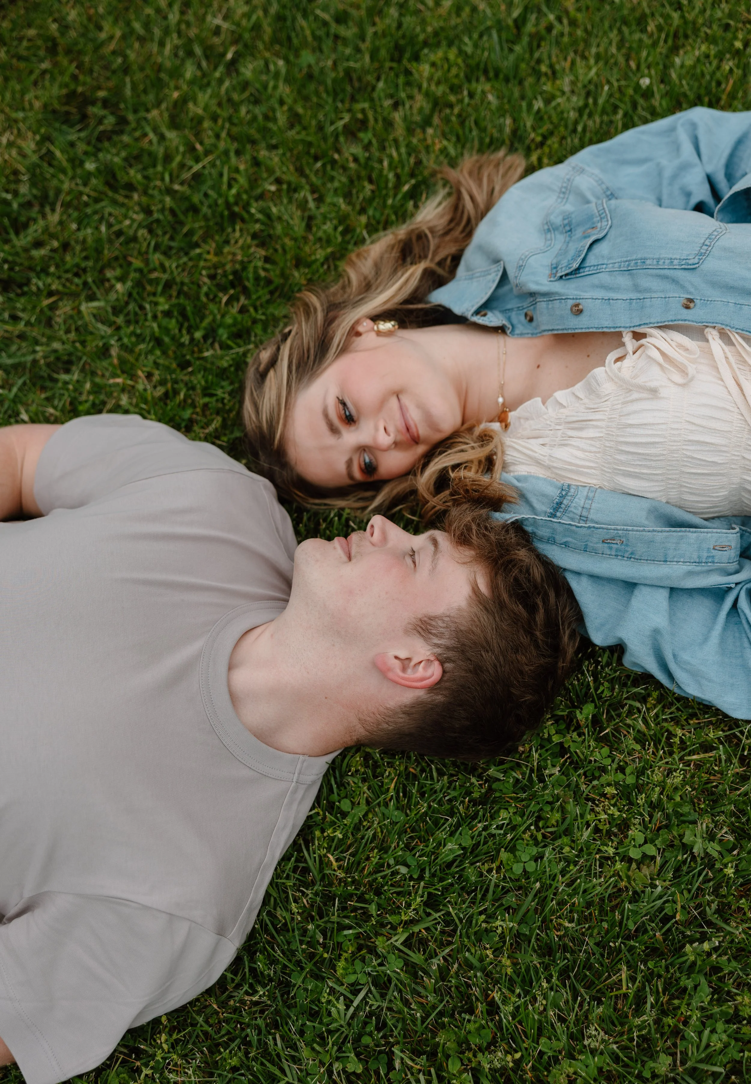 candid-engagement-photos-waveland-grass.jpg