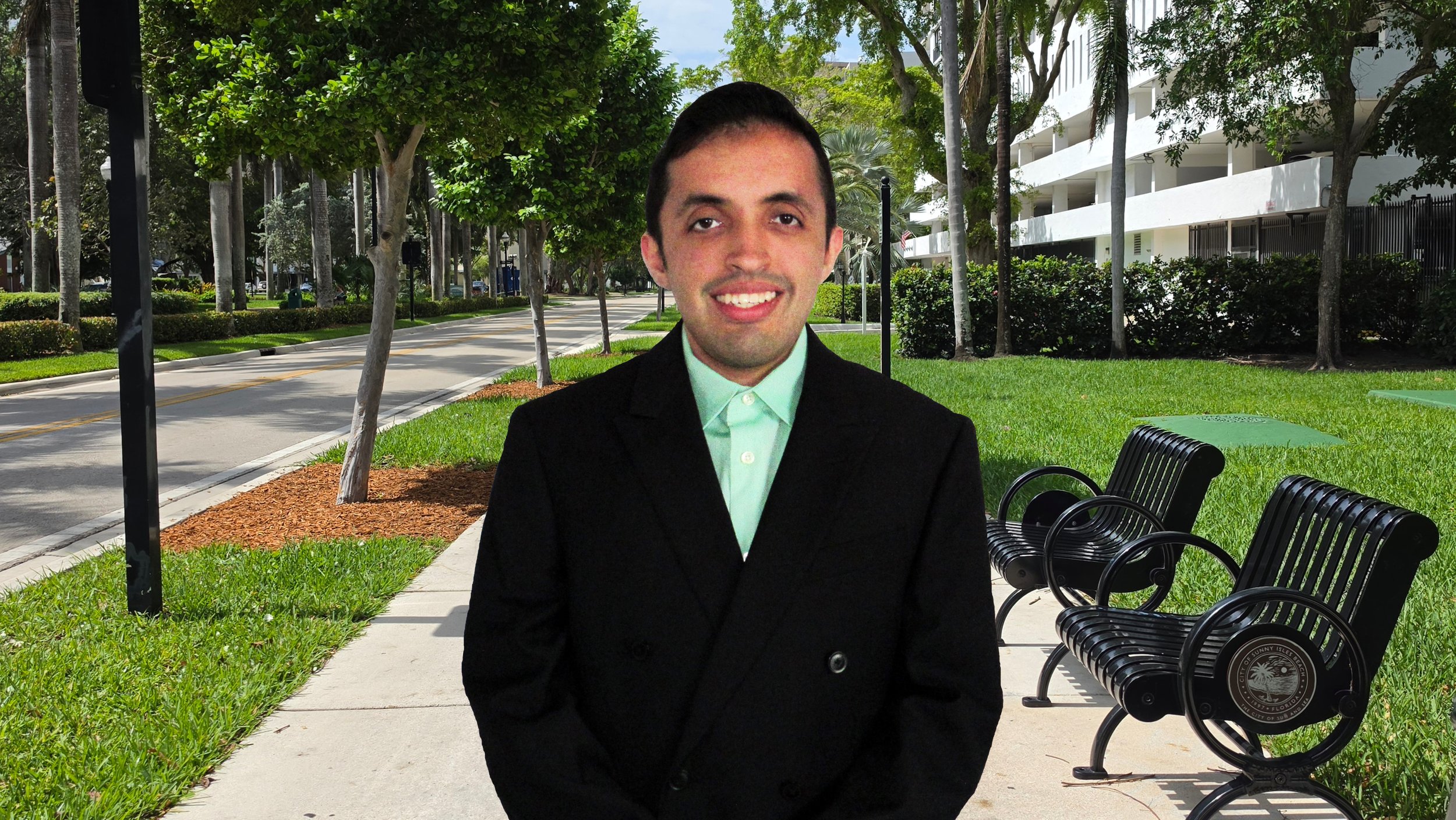 David Vergel along North Bay Road's sidewalk.