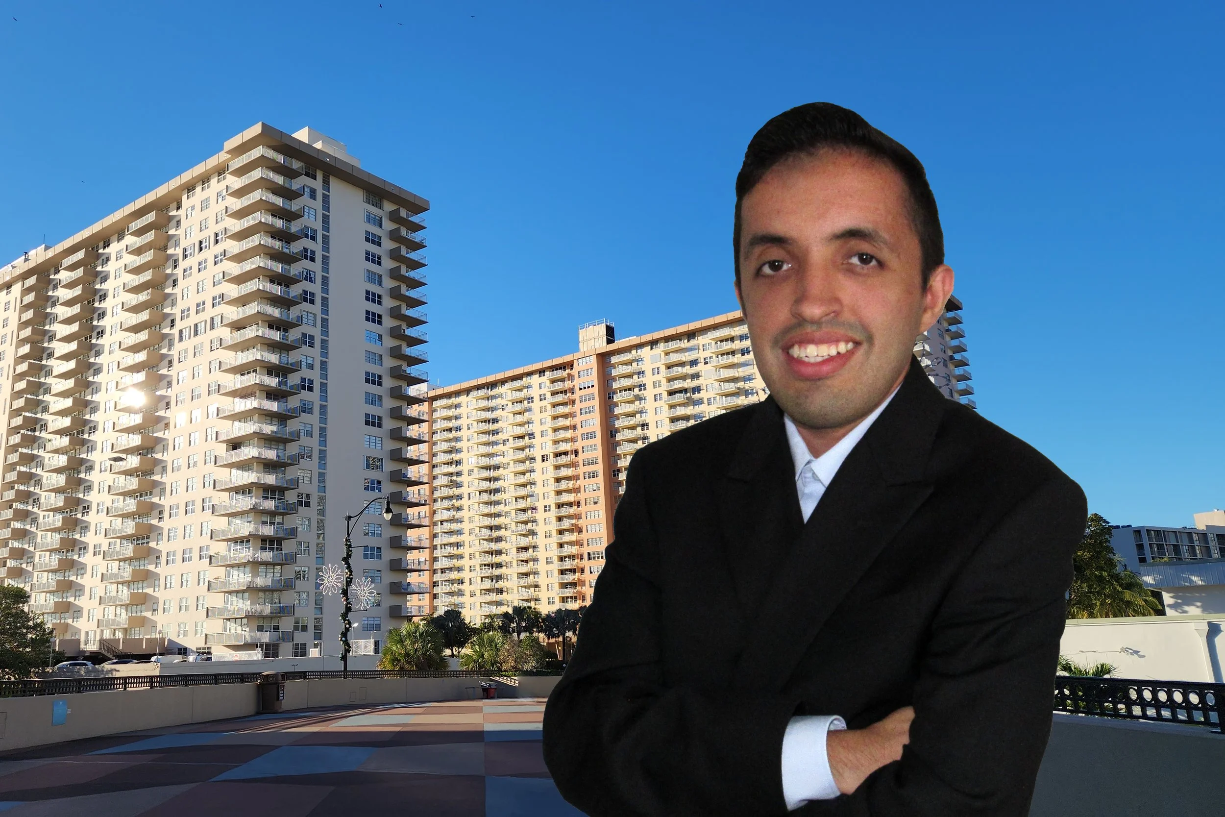 David Vergel with his arms crossed on the North Bay Road Pedestrian Bridge.