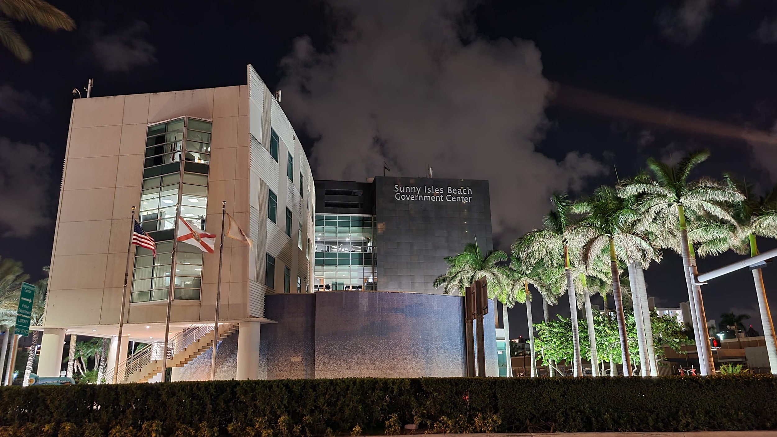 The Sunny Isles Beach Government Center at night as seen from Collins Avenue.