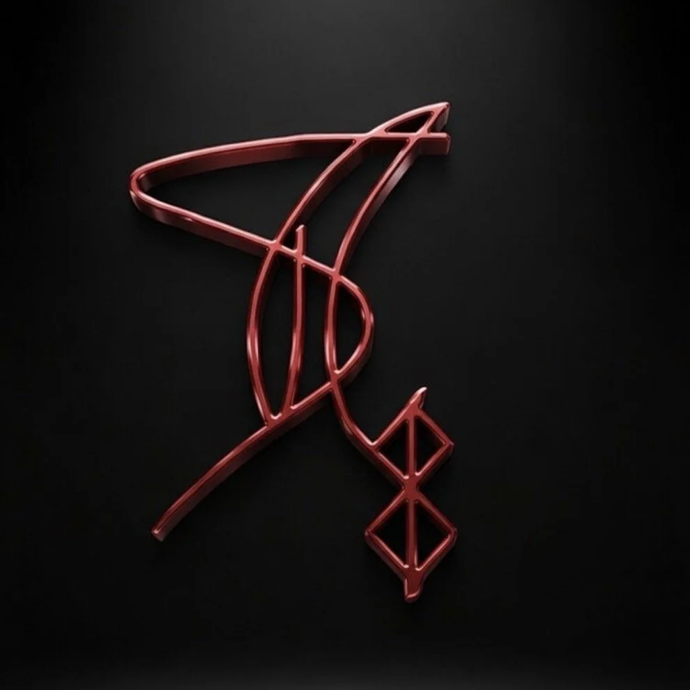 Red neon sign in the shape of a lipstick on a black background.