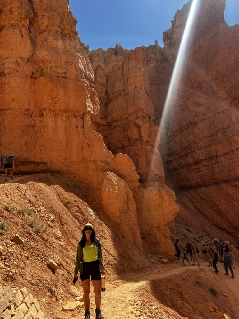 Kylie Ransom hiking outdoors, demonstrating an active lifestyle and healthy aging.
