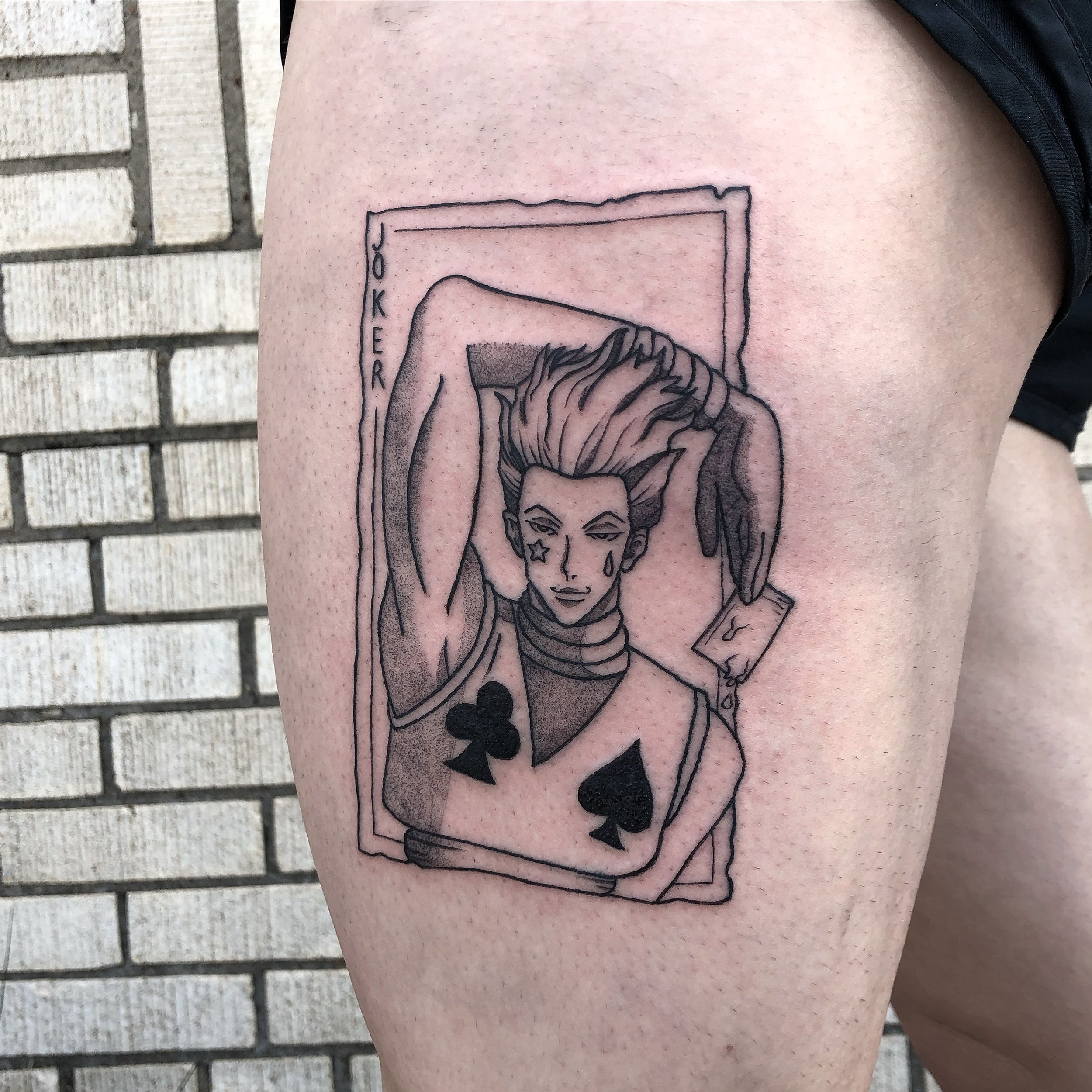 anime tattoo of Hisoka from HxH, done with dot work shading