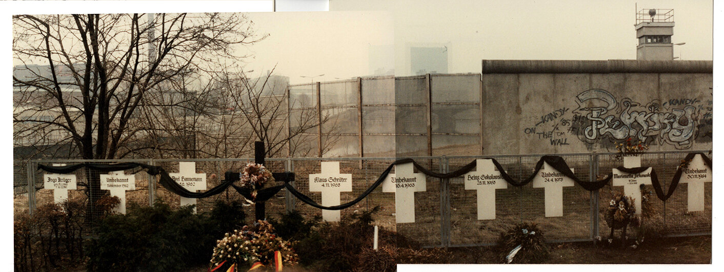 In the memory of those that tried to get across the Wall and failed. East German guard tower in background.