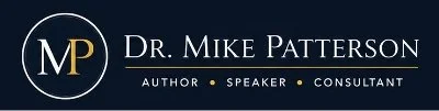 Business card for Dr. Mike Patterson, author, speaker, and consultant, featuring his initials MP in gold on a black background.