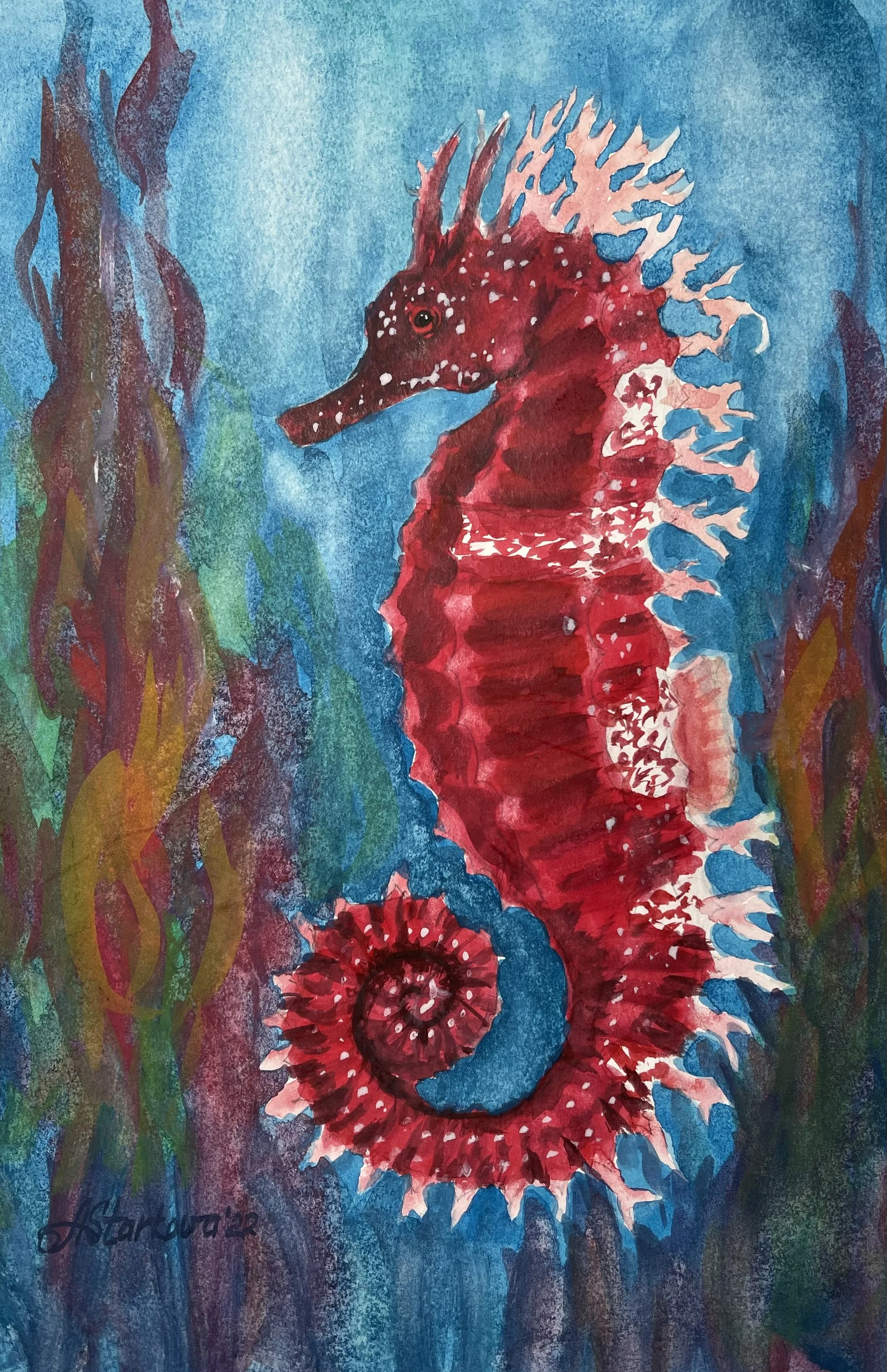 A colorful watercolor painting of a seahorse with a vibrant red body, white accents along its spine, and a curled tail. The background features an underwater scene with tall, wavy seaweed and a blue-green water gradient.