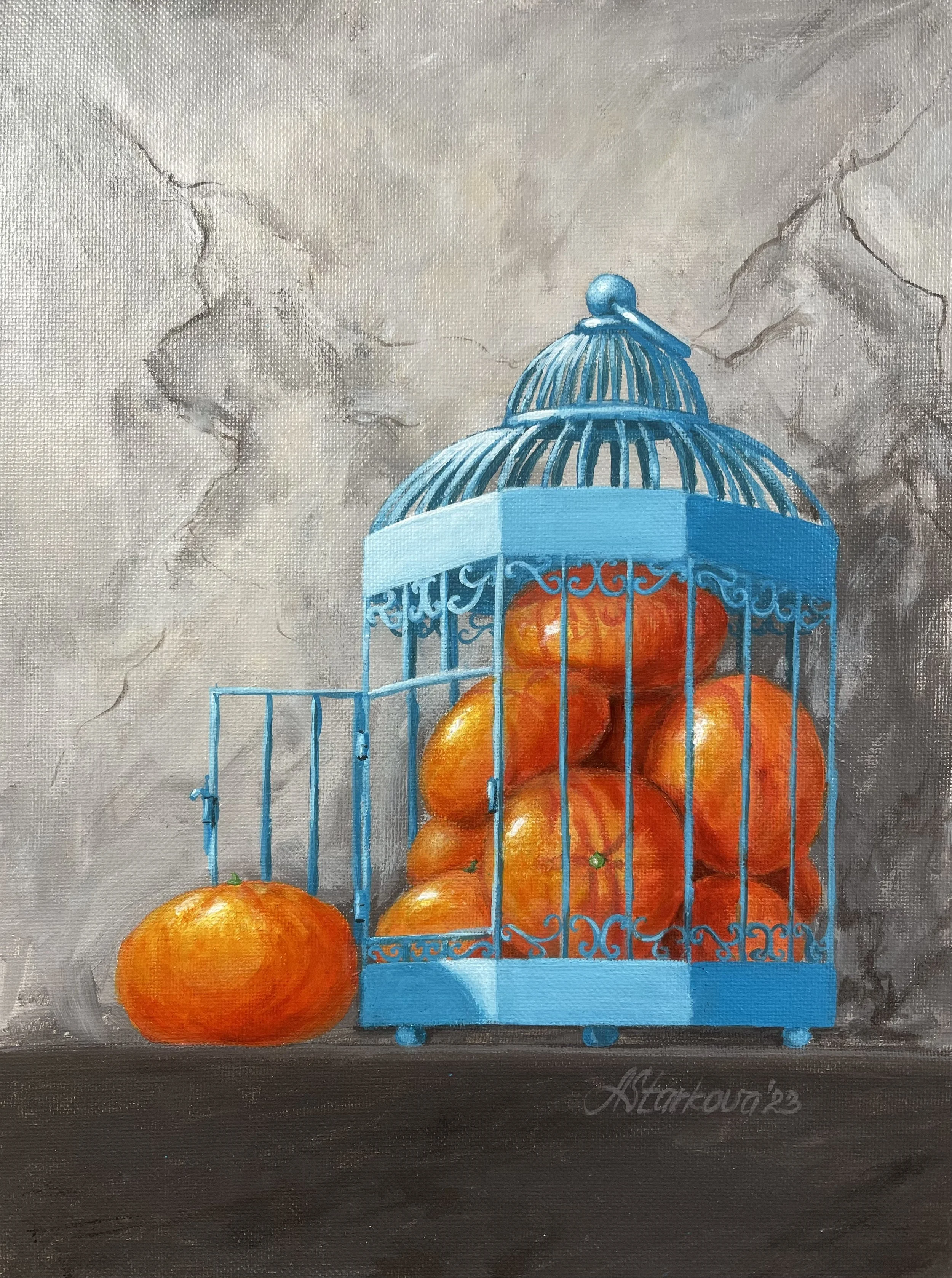 Painting of mandarins or clementines inside a blue birdcage with one mandarin outside the cage, set against a gray textured background.