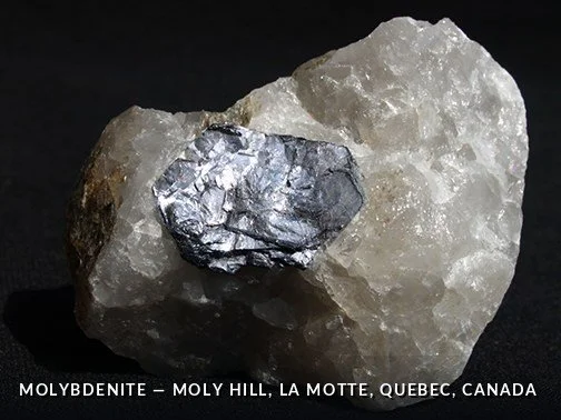 Molybdenite - MolyHill, LaMotte, Quebec, Canada.jpg