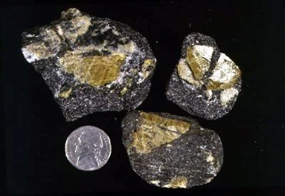 Titanite (Sphene) - Beautiful green-colored "gemmy" crystals, similar to the very first specimen pictured above, are formed in amphibolite. These specimens collected from 167th Street and the Harlem River. E. Schernikow Collection.