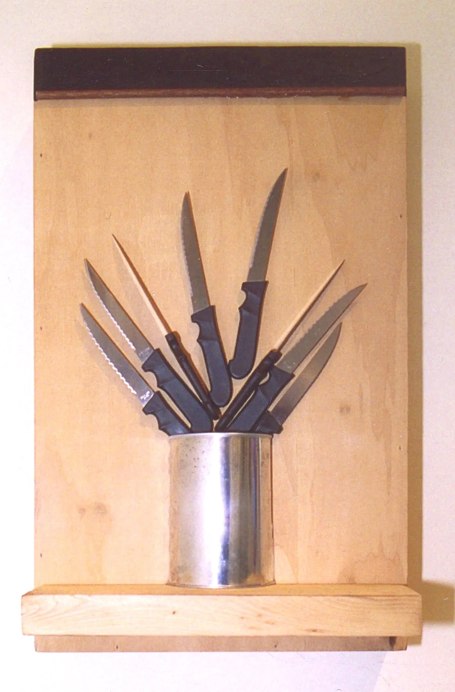  Bouquet of Knives , 2010. Tin, plastic, stainless steel, oil on wood – 24" X 15" X 4" SOLD 