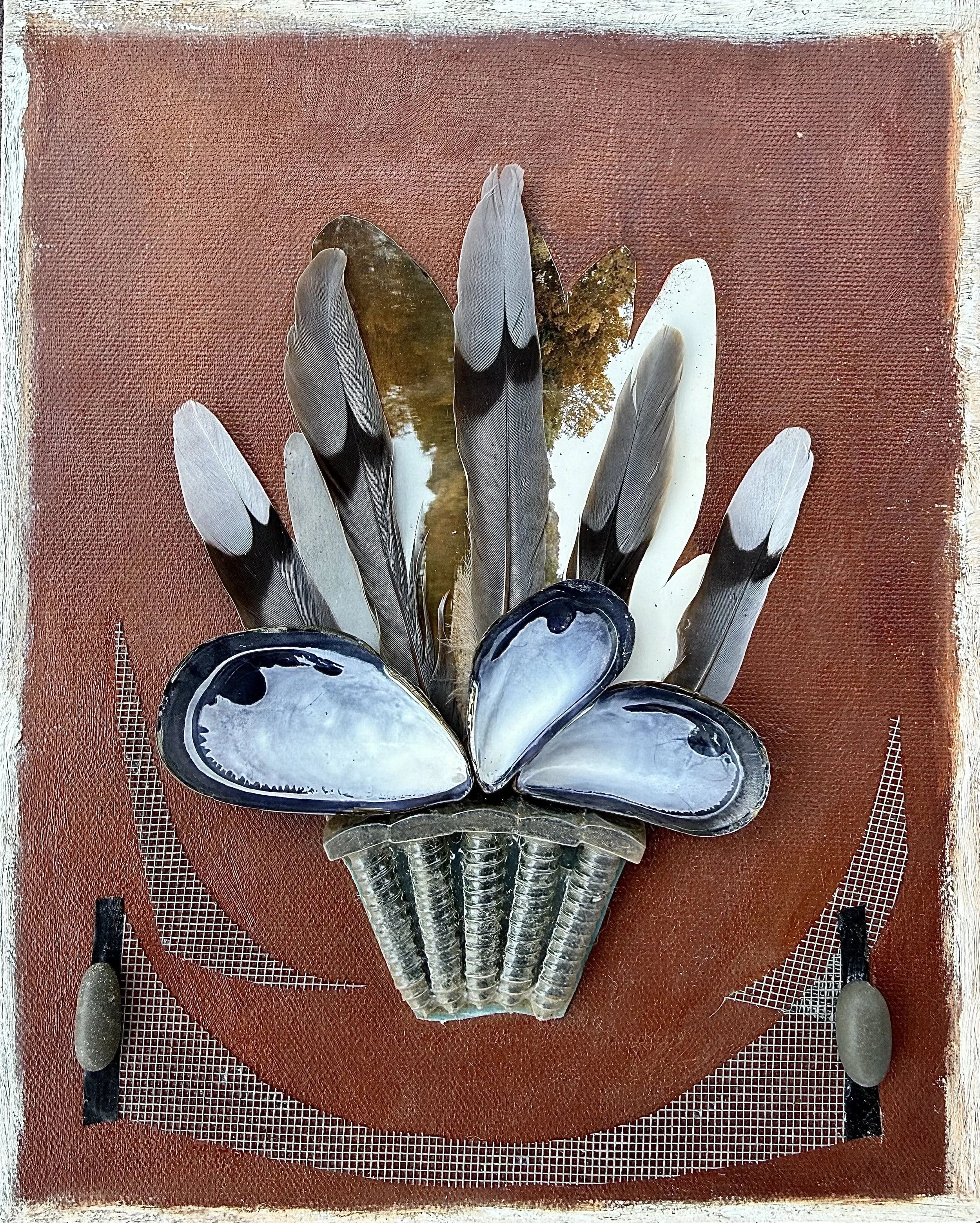  Offering , 2025. Shells, feathers, screws, photo, nylon, pebbles, plastic, electrical tape, oil on canvas – 12" X 9" X 1"