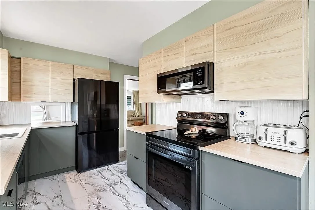 Bright updated kitchen representing downsizing and planning for a home's next chapter.