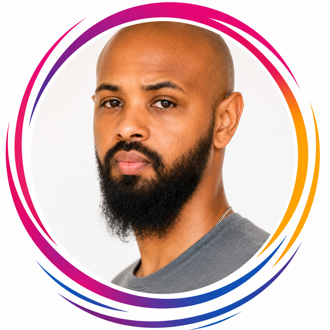 Close-up portrait of a man with a shaved head and full beard, wearing a gray shirt, against a white background with colorful circular design elements.