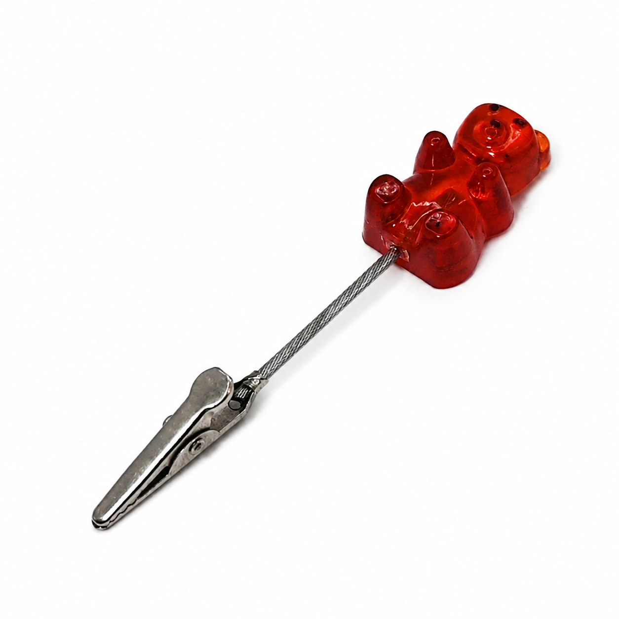 Orange resin gummy bear roach clip
