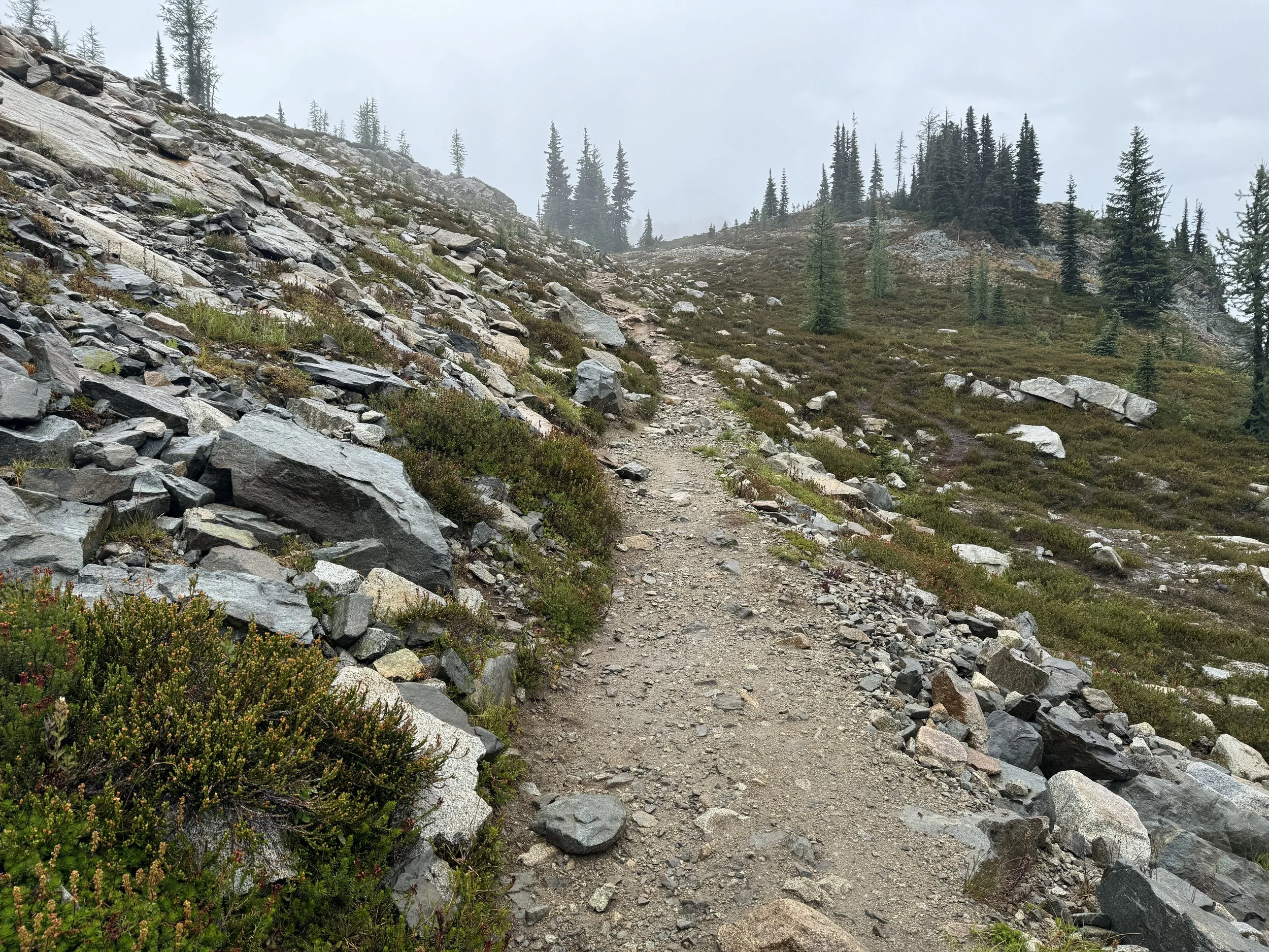 A rocky mountain trail depicting the journey of healing and wholeness.