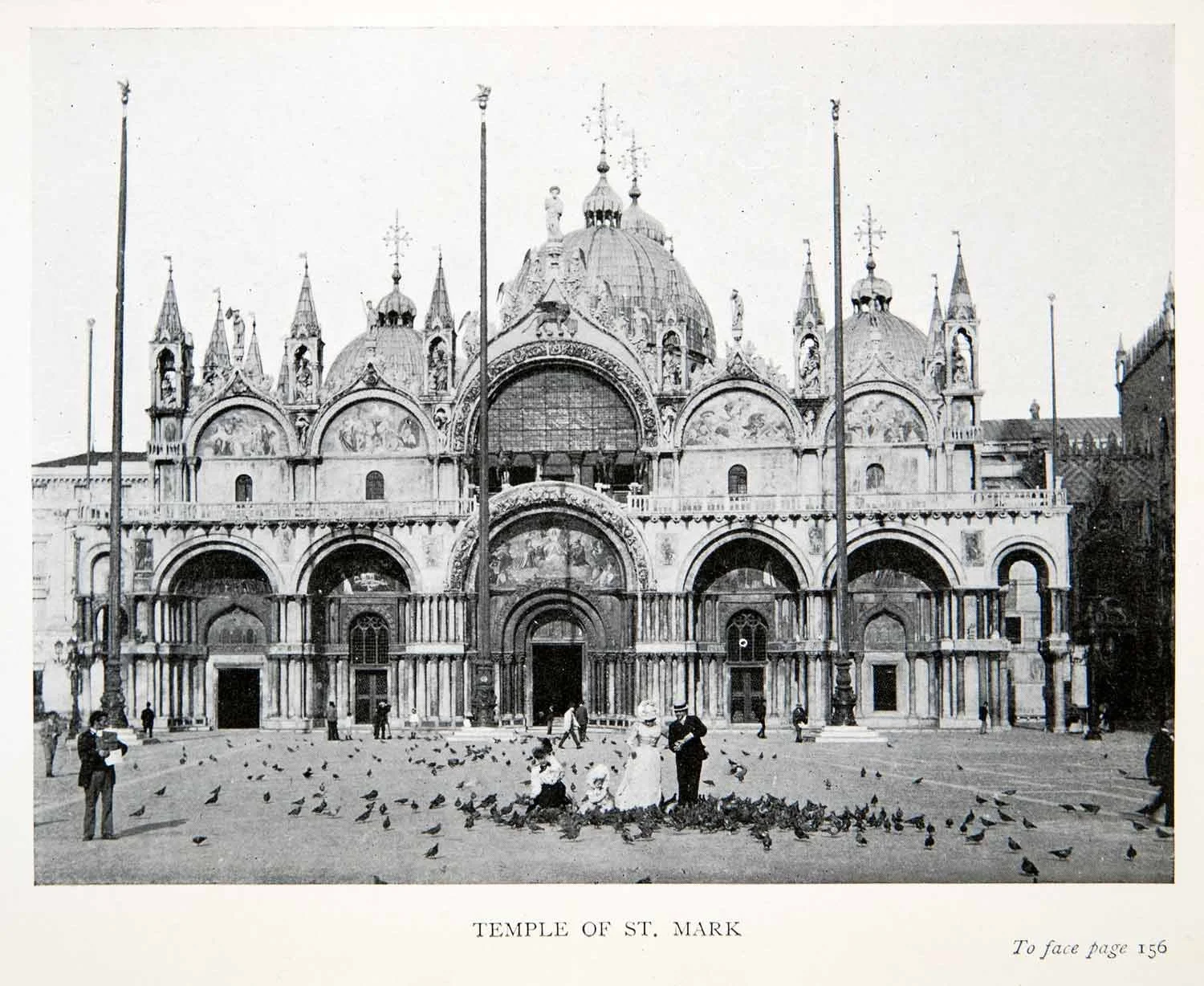 Historical black and white photograph of the Temple of St. Mark in Venice, Italy, showing its intricate Gothic architecture and a plaza with people and pigeons in the foreground.