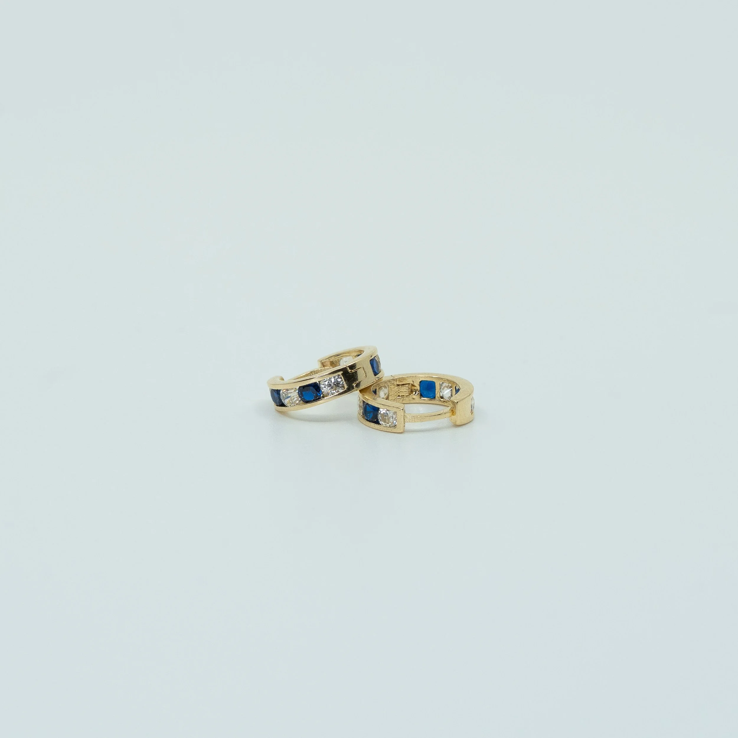Huggie Hoop Earrings with Blue/White Gems