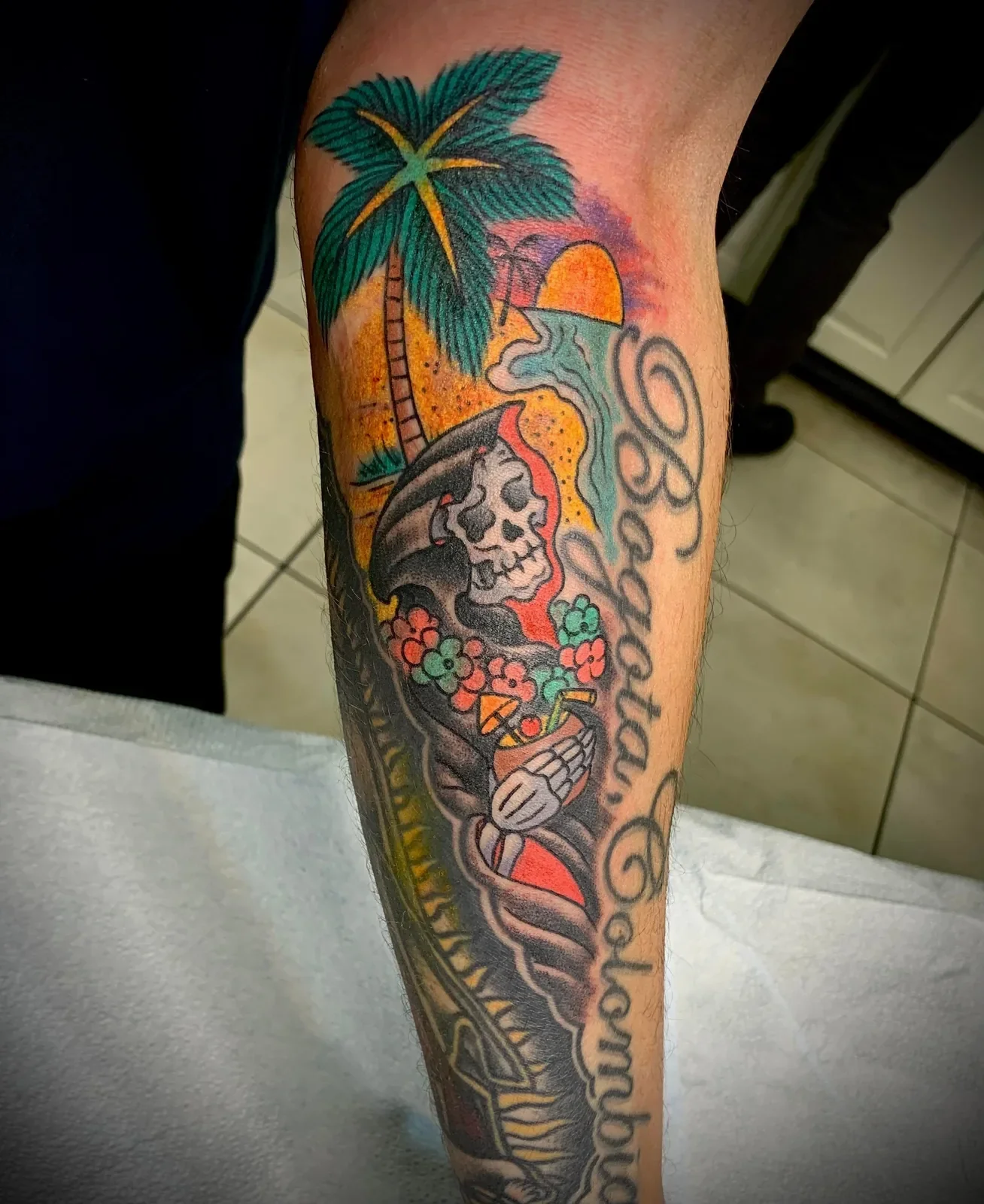 Vacation Reaper — tropical sunset, palm, floral lei and umbrella drink. Playful take on classic death motif.
