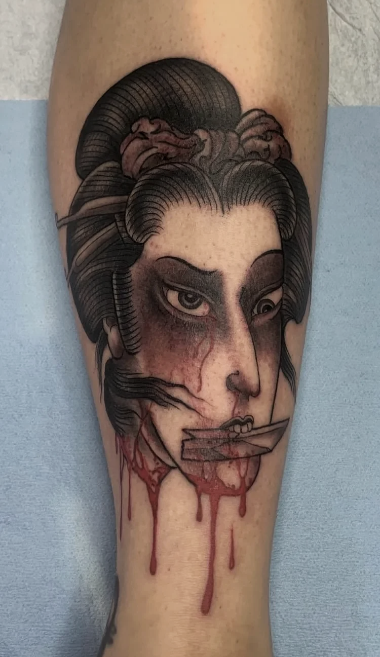 Namakubi geisha with seppuku blade. Japanese traditional with a dark twist and whip shading, blood texture, strong silhouette. Shin piece.