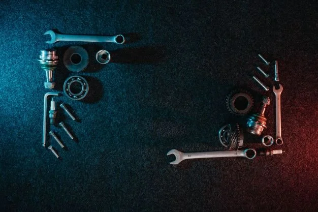 Professional automotive repair tools and specialized equipment arranged for engine service