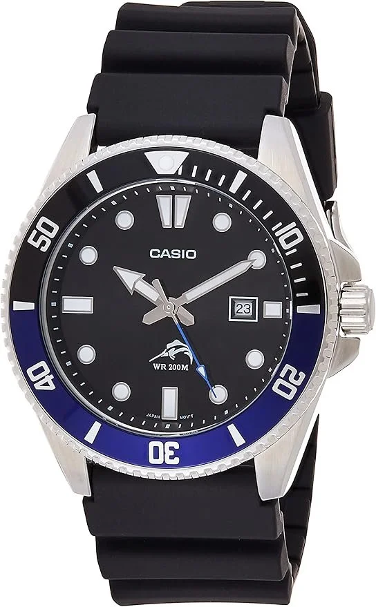 Casio diver's watch with black dial, black and blue bezel, and black strap, displaying time, date, and water resistance.