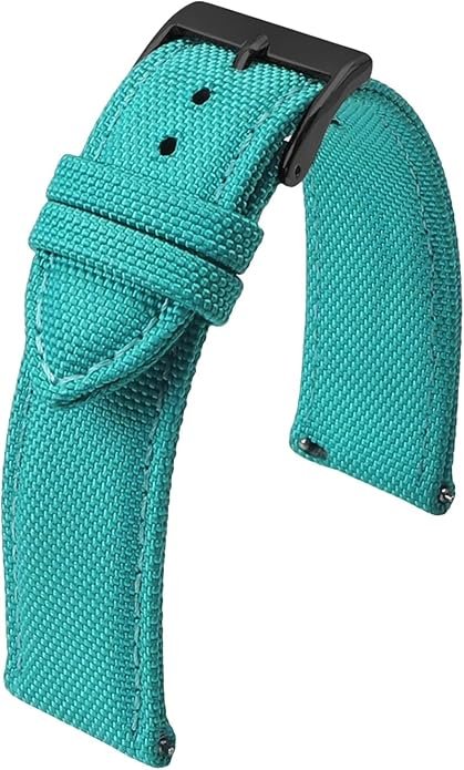A close-up of a turquoise fabric watch strap with a black buckle.