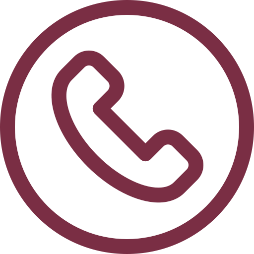 Icon of a telephone handset inside a circle, representing a phone call or contact