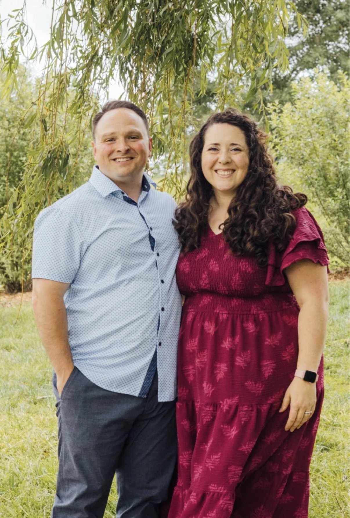 Adam and kristen Ladenburger portrait photo under a tree