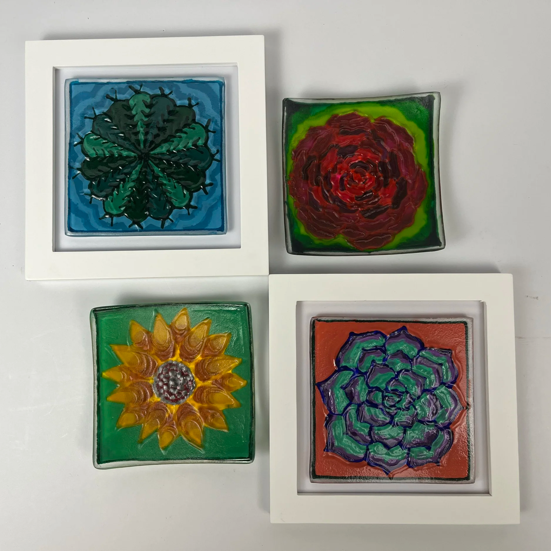 Nature inspired textured glass framed wall art hand painted with cactus, flower, and succulent designs