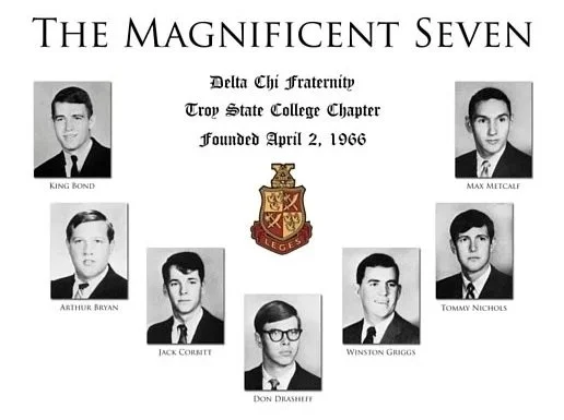A page honoring The Magnificent Seven, a Delta Chi fraternity chapter at Troy State College, founded April 2, 1966, featuring black and white photos of seven young men with their names and a Delta Chi crest.