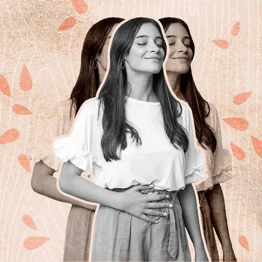 A woman with long dark hair smiling with her eyes closed, standing with two different women behind her, also smiling. The background is light with pinkish floral patterns.