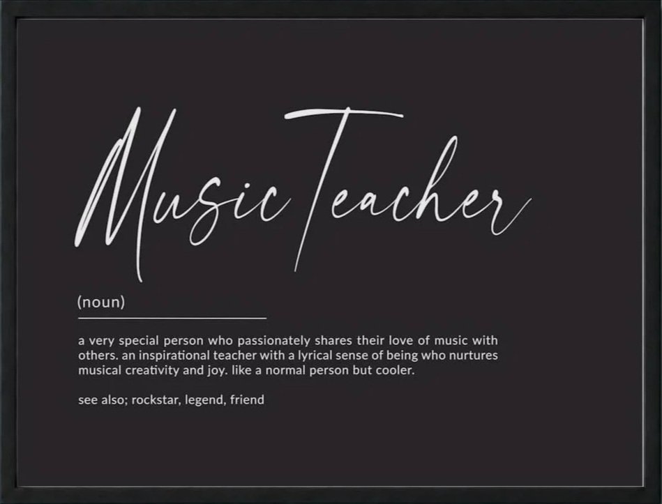 Black framed sign with the words "Music Teacher" written in white cursive font at the top. Below, a definition states, "a very special person who passionately shares their love of music with others. an inspirational teacher with a lyrical sense of being who nurtures musical creativity and joy. like a normal person but cooler." The sign also suggests to see also: rockstar, legend, friend.