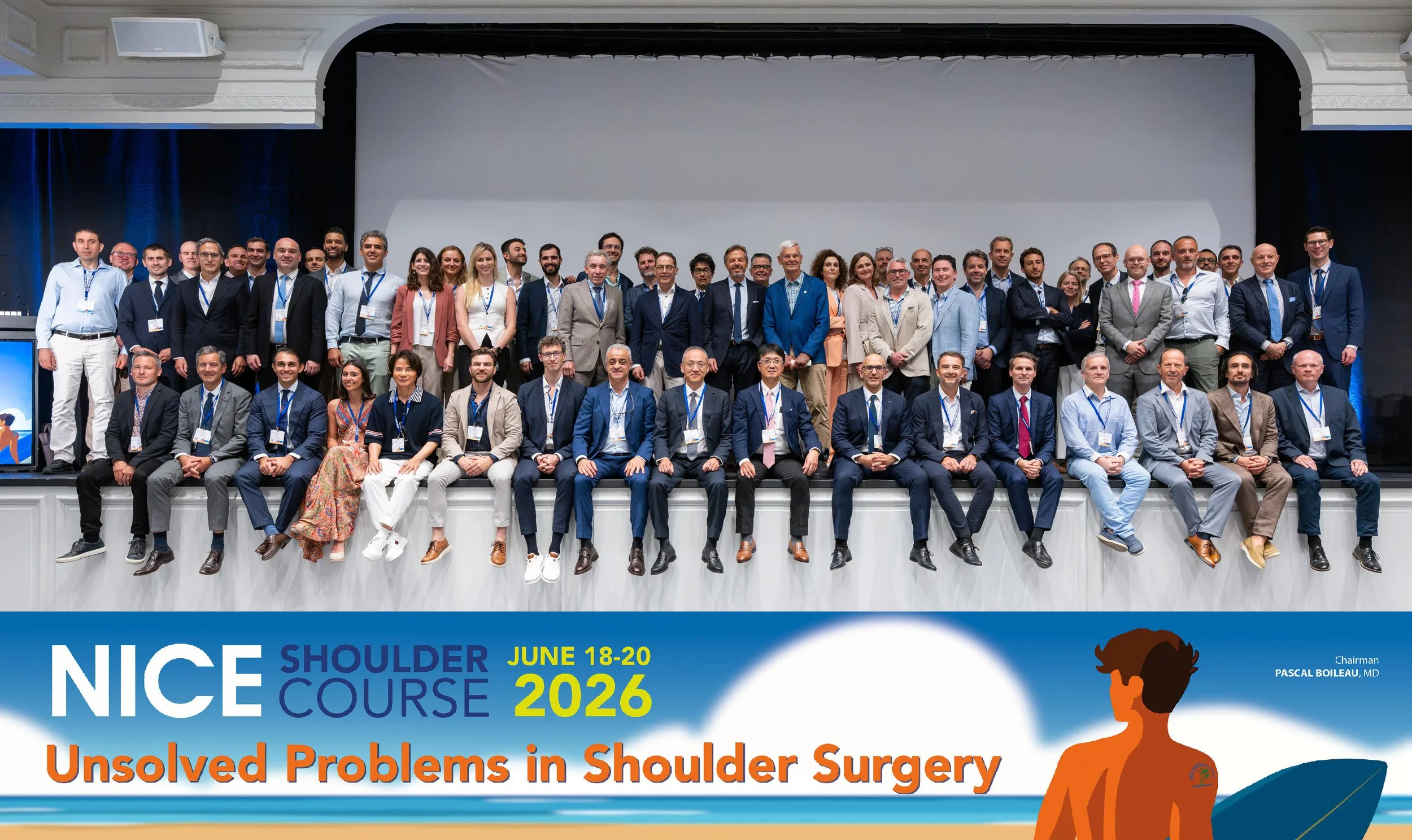 Group of conference attendees, including Dr. Abdul-ilah Hachem in the front row, posing on stage at the NICE Shoulder Course 2026, held June 18-20, invited by Dr. Pascal Boileau.